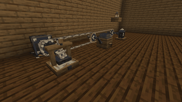 One Motor turning a row of machines by rope and chain belts