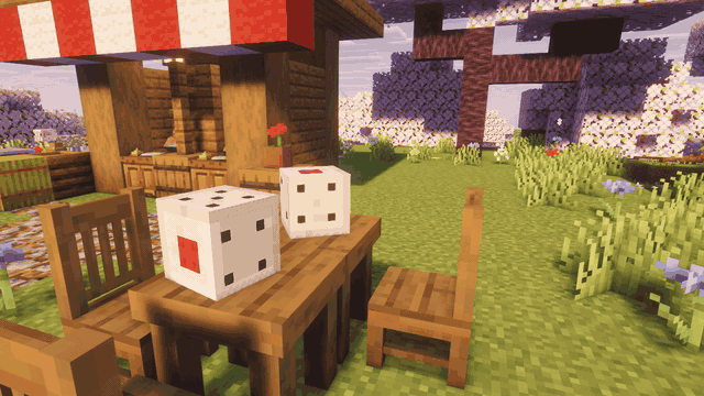 Two dice tossed onto a table, tumbling to rest