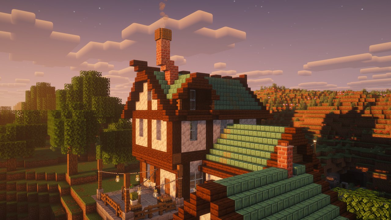 A timber house at sunset, its lanterns lit